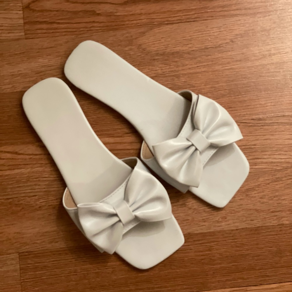 White leather bow tie sandals